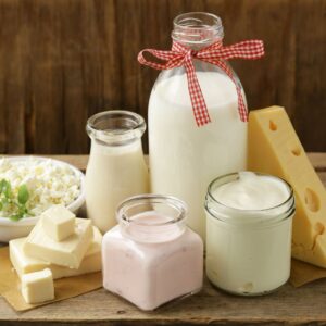 Selection of farm fresh dairy products: milk, cheese, yogurt, and butter